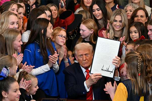 Trump signs order barring trans athletes from women’s sports