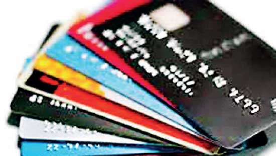 Outstanding credit card balance takes a dip in May