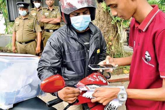 Issuing fuel using QR code commences