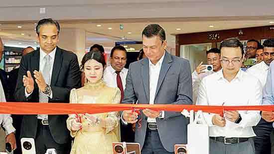 Singer unveils 1st Honor Experience Store at One Galle Face