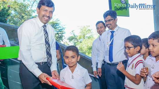 People’s Bank opens school banking unit with a CDM at Dharmaraja College - Kandy