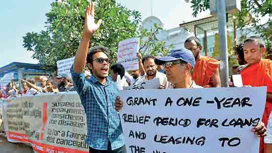 FSP protests in Colombo seeking loan relief after Ditwah disaster