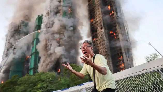 4 dead after fire engulfs residential high-rise buildings in Hong Kong