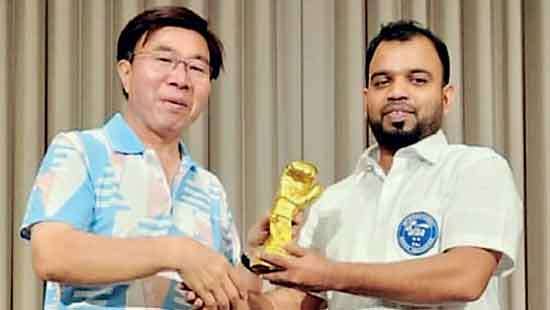 Sugathadasa, village referee who hobnobs among elite