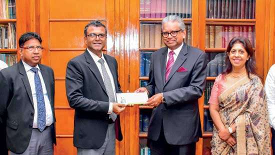 National Savings Bank hands over Rs.6bn dividend to Treasury