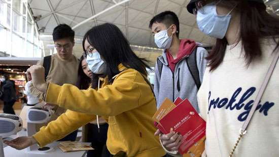 China warns coronavirus may spread as death toll jumps to 9