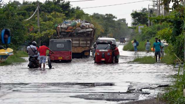 Heavy rains flood roads