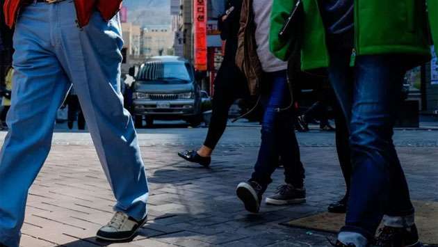 Woman fined for pulling down male colleague’s trousers