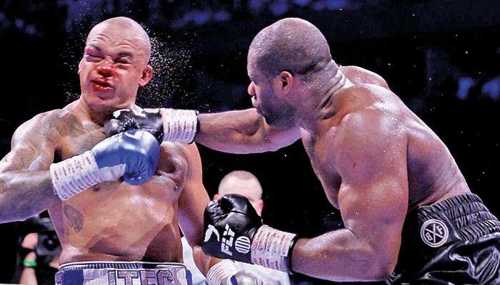 Dubois climbs off the canvas to become two-time world heavyweight champion