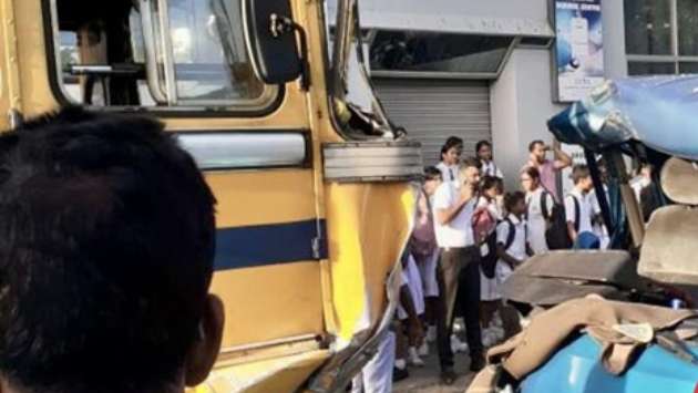 School van–bus collision injures three children