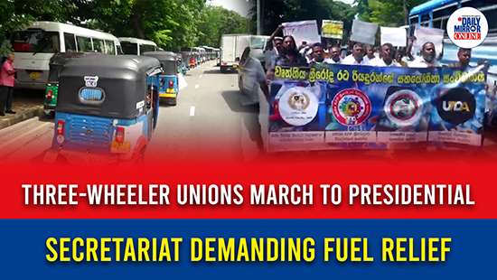Three-wheeler unions march to presidential secretariat demanding fuel relief