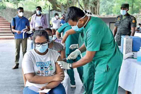 People seen at the vaccination centre at Viharamahadevi park for their booster vaccine