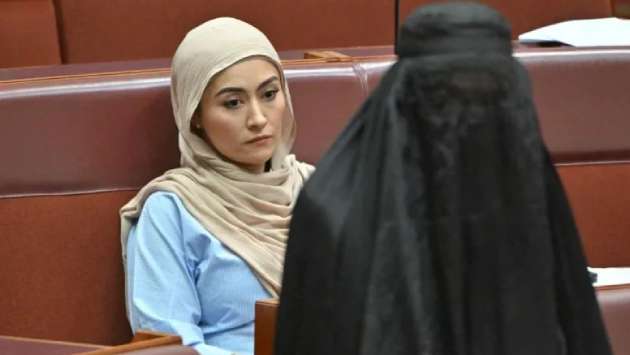 Australia senator suspended after burka stunt in parliament