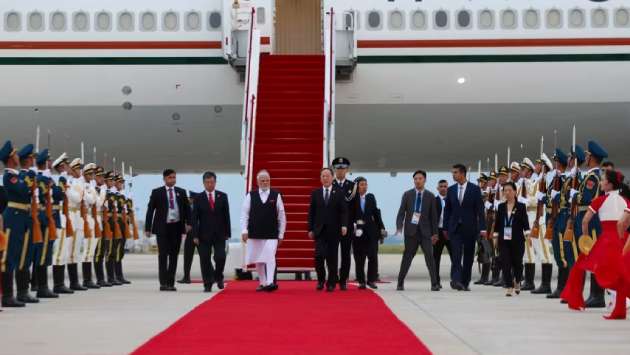 India’s Modi meets Xi on his first China trip in seven years as Trump’s tariffs bite