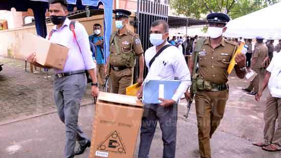 Ballot boxes taken under heavy security