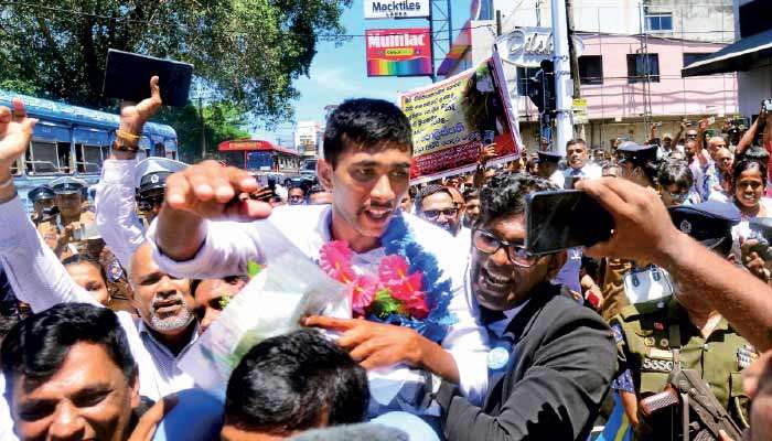 Policeman welcomed by supporters after release
