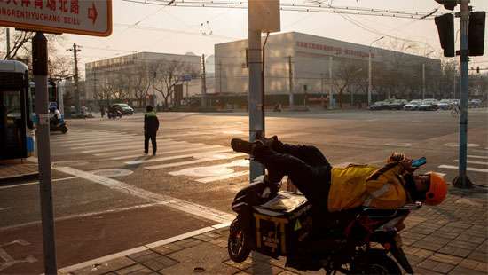 China’s booming gig economy masks job market pain, strains welfare system