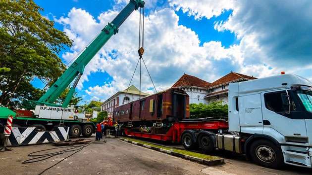 Rail compartment transported by road