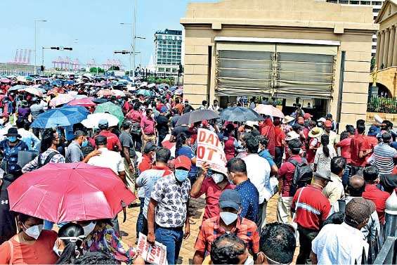 Health workers march urging government to address their grievances