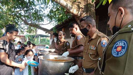 Cops feed students...