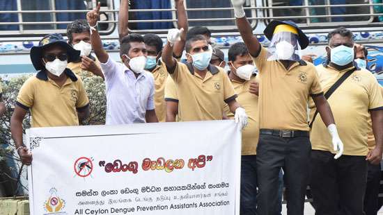 Dengue Prevention Assistants in protest