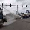 Police fire water cannons to disperse protesters