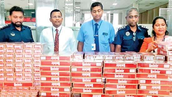 BIA Customs thwart attempt to smuggle in Rs.16Mn worth fags with five inbound passengers