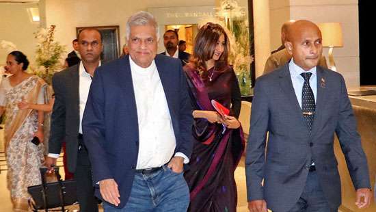 Only three officials join President’s delegation to UK