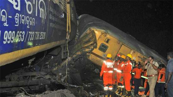 At least 10 dead after trains collide in southeast India