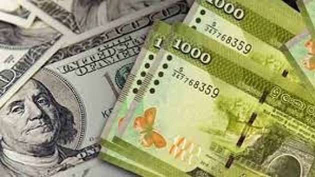 Rupee appreciates slightly against US Dollar