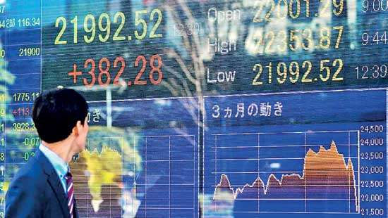 Asian markets enjoy gains as focus turns back to trade talks