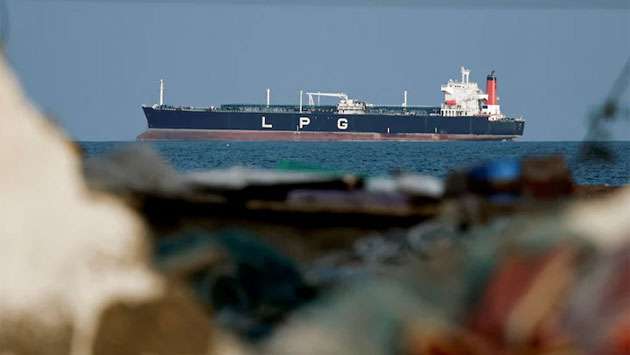 Trump demands other countries help secure vital Strait of Hormuz as Iran vows defiance