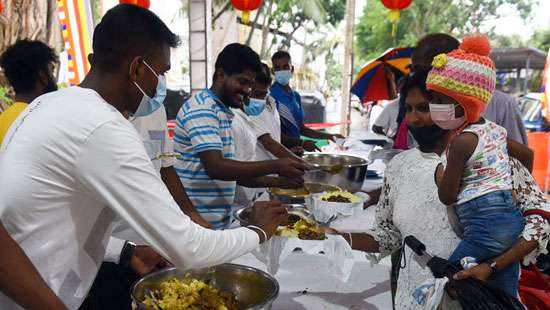 Sharing meals on Vesak