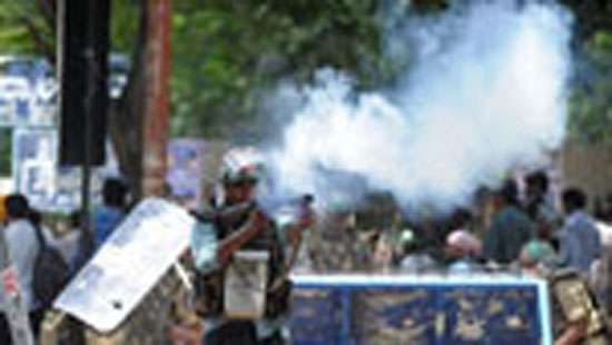 Police use tear gas at IUSF protest