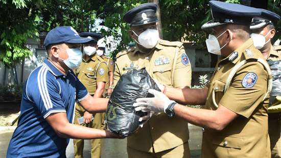 Police officers get essential food parcels....