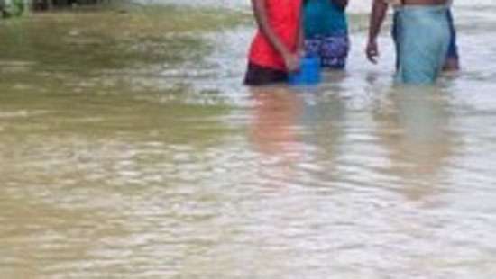 Two schoolgirls, youth marooned in floods, rescued