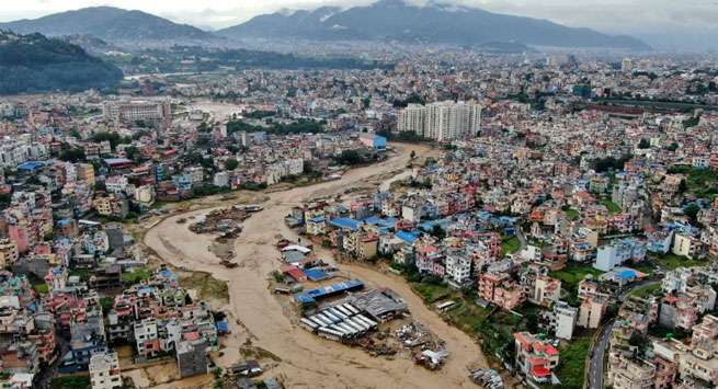 Nepal flooding and landslides kill nearly 200 people