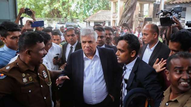 People gather at several places in Colombo in support of Ranil