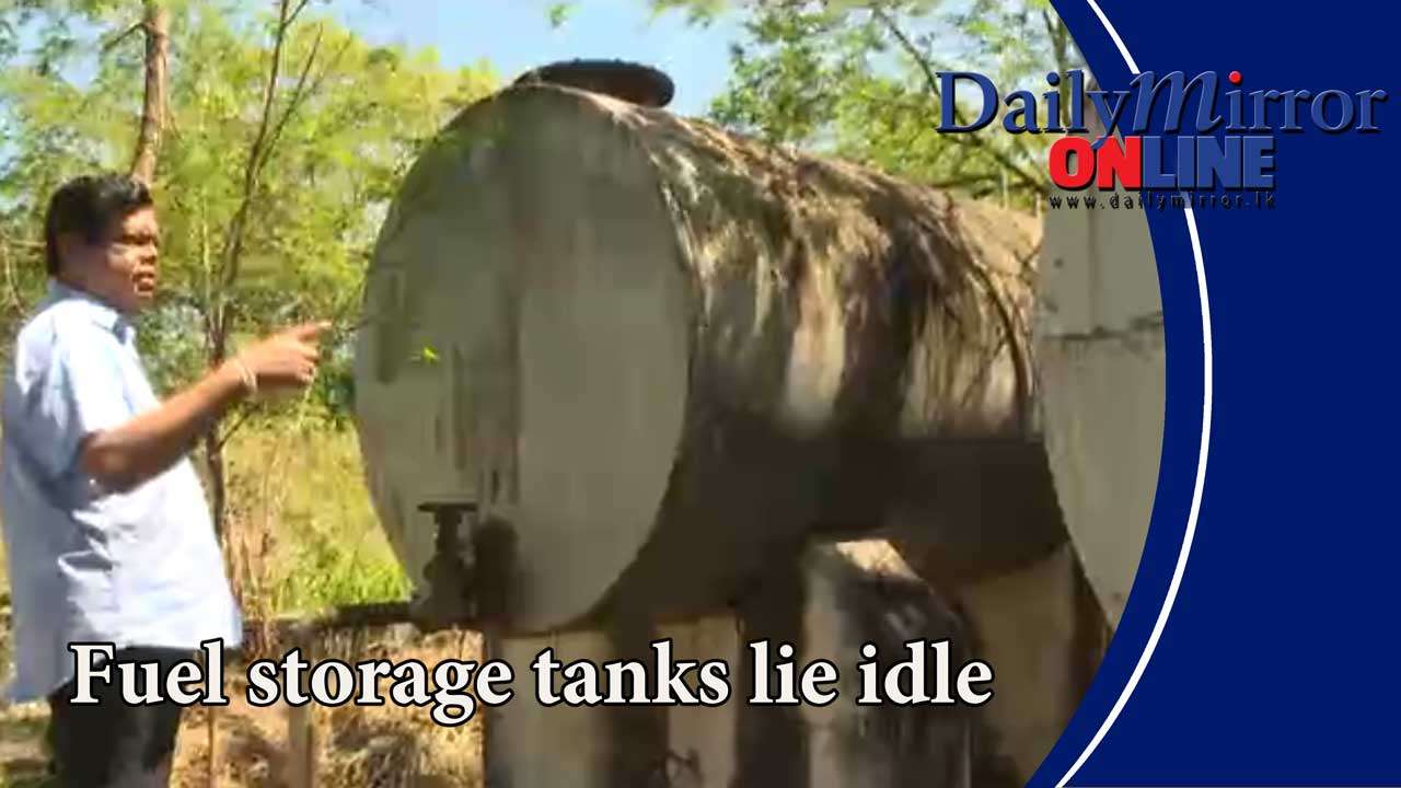 Fuel storage tanks lie idle