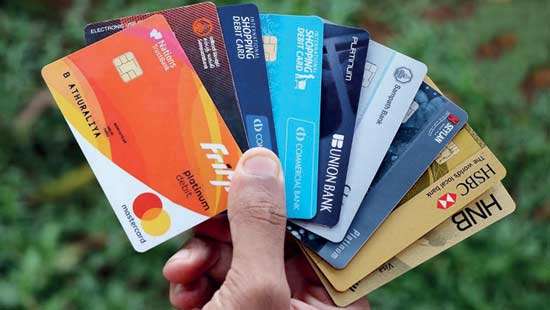 Credit card outstanding balance chugs along in October