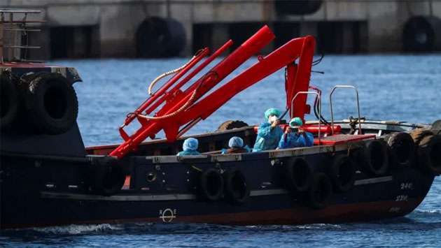Spain starts evacuating virus-hit cruise ship in Tenerife