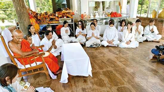 Invoking blessings on disaster victims Japanese Buddhist Society holds religious programme at Kataragama Kiri Vehera