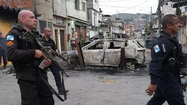 Brazil police raid on Rio drug trafficking gang leaves at least 64 people dead