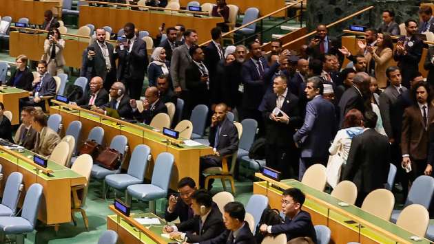Dozens of delegates walk out of UN hall as Israeli prime minister prepares to speak