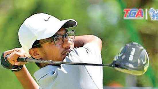 Dhanushan claims top spot