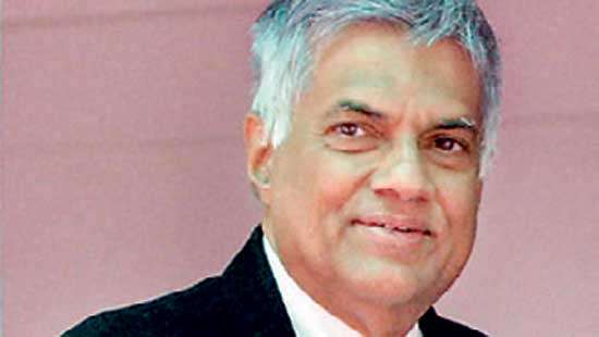 Ranil says no national govt.  But calls for all parties to unite to come out of crises