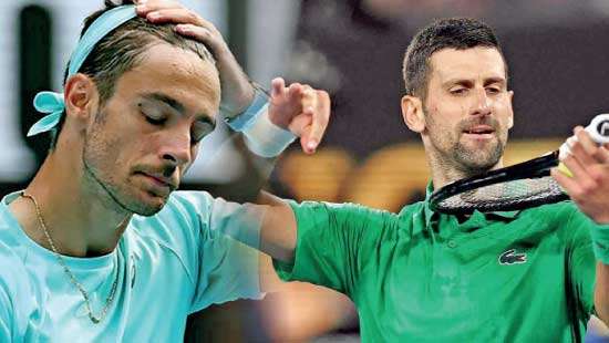 Opponent  injured, Djokovic escapes