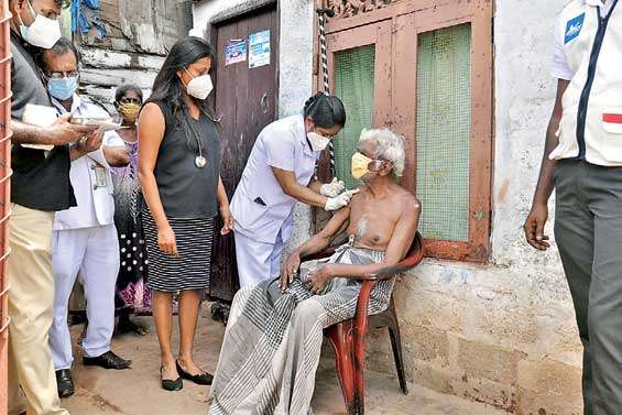 Health worker assisting in vaccination drive