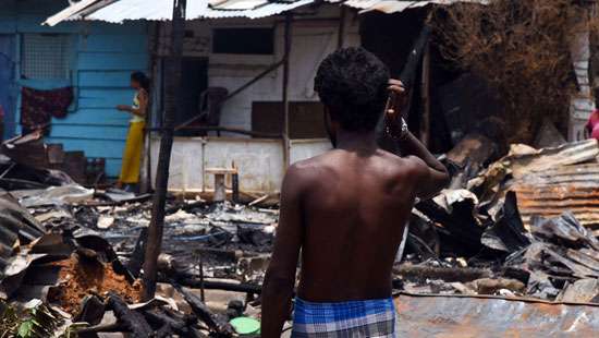 Houses gutted by fire in  Thotalaga