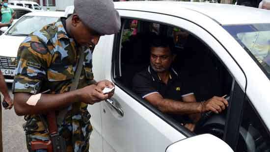 Air Force personnel checking fuel tokens at filling station